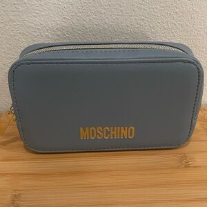Moschino Light Blue Airline Amenity Bag with Gold Logo